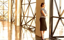 Woman looking out window
